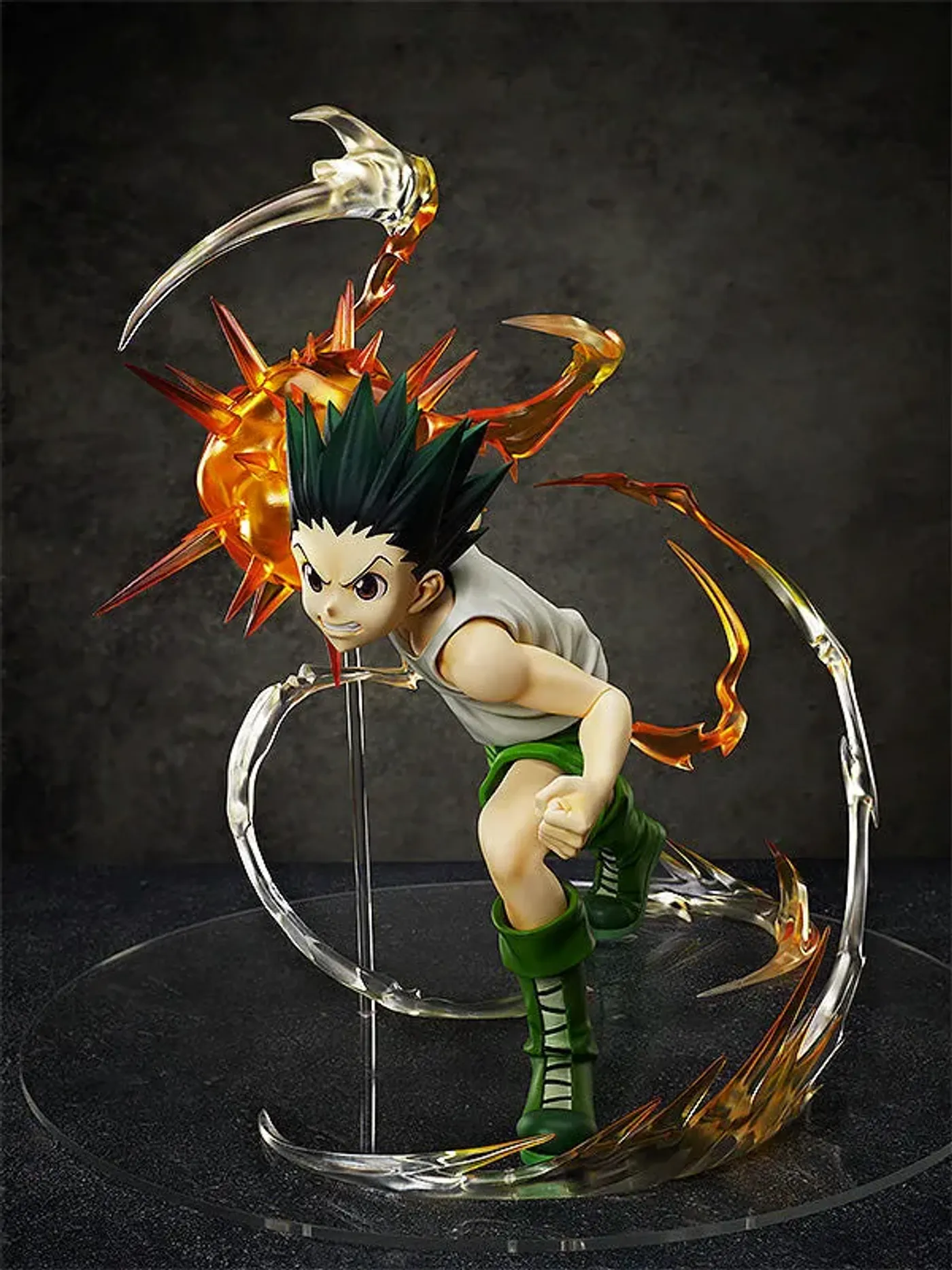 Close view of the sculpted muscle detail on the Gon Freecss figure