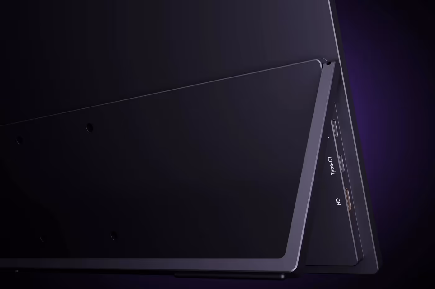 Monitor with integrated foldable stand for portable and desktop use
