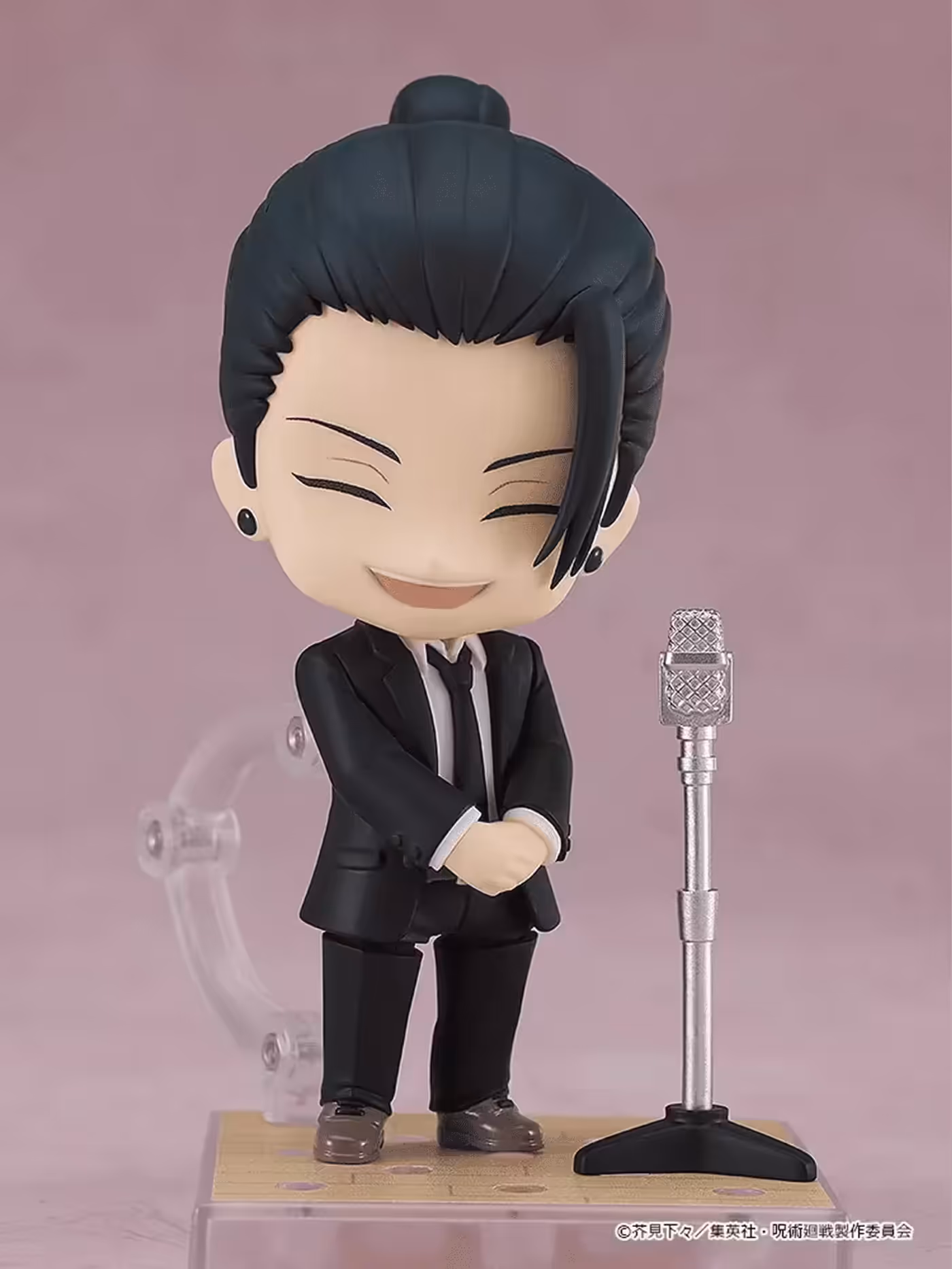 Nendoroid Suguru Geto in his suit version with a laughing expression and microphone stand