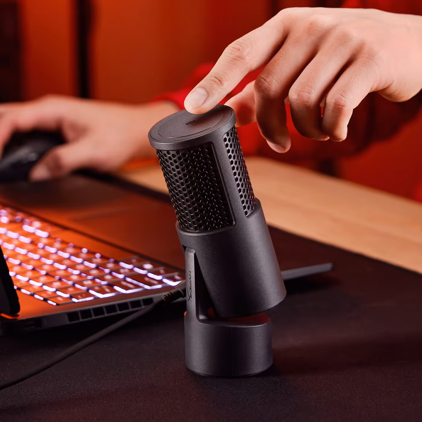 Close up of tap-to-mute button with LED status indicator