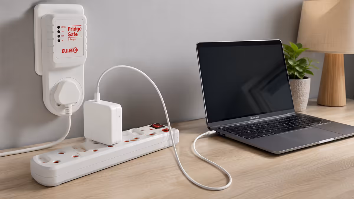 Ellies surge protector with MacBook charger plugged in.