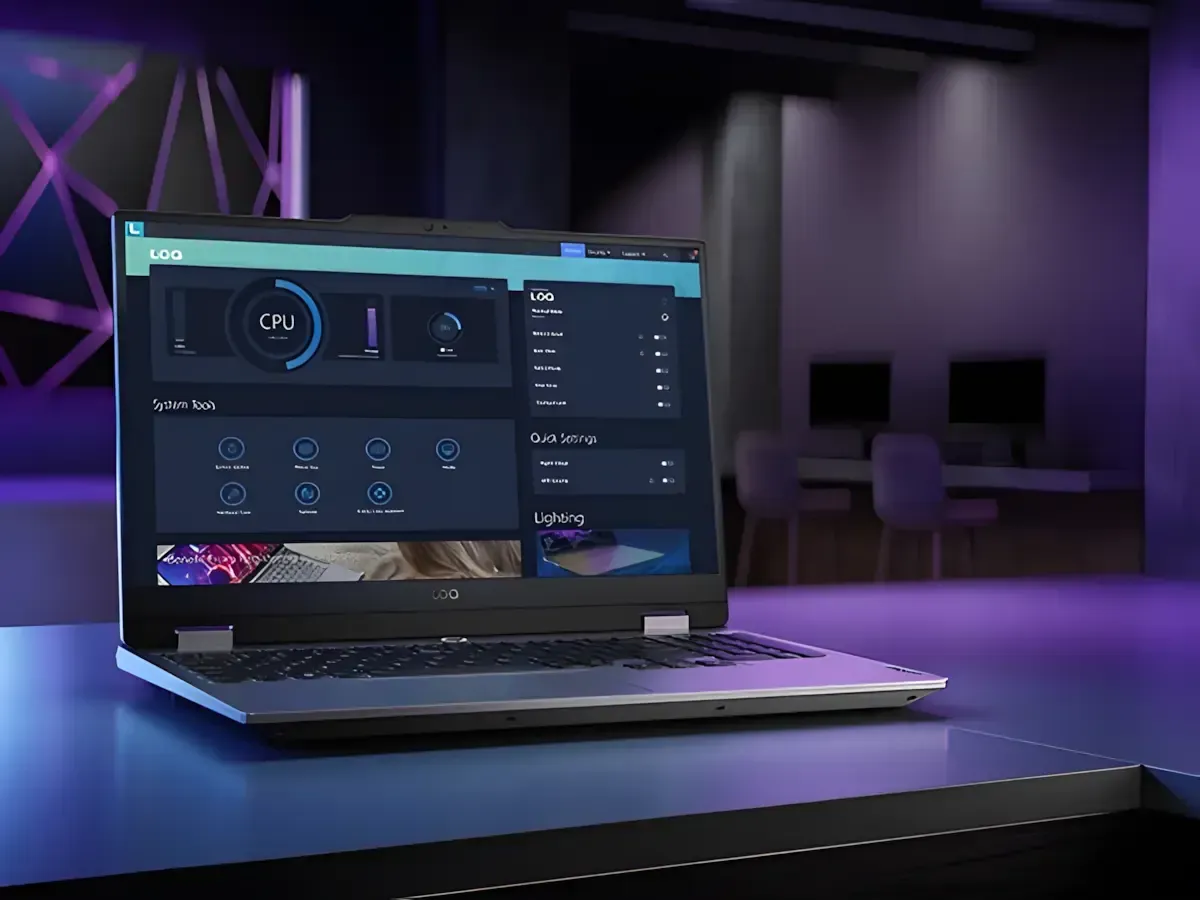 Lenovo LOQ 15IAX9 gaming laptop on a desk, with Lenovo Vantage menu on the display
