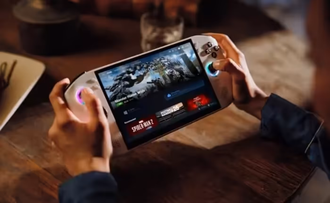 Hands using a Legion Go S on a table in a bar playing a Monster game