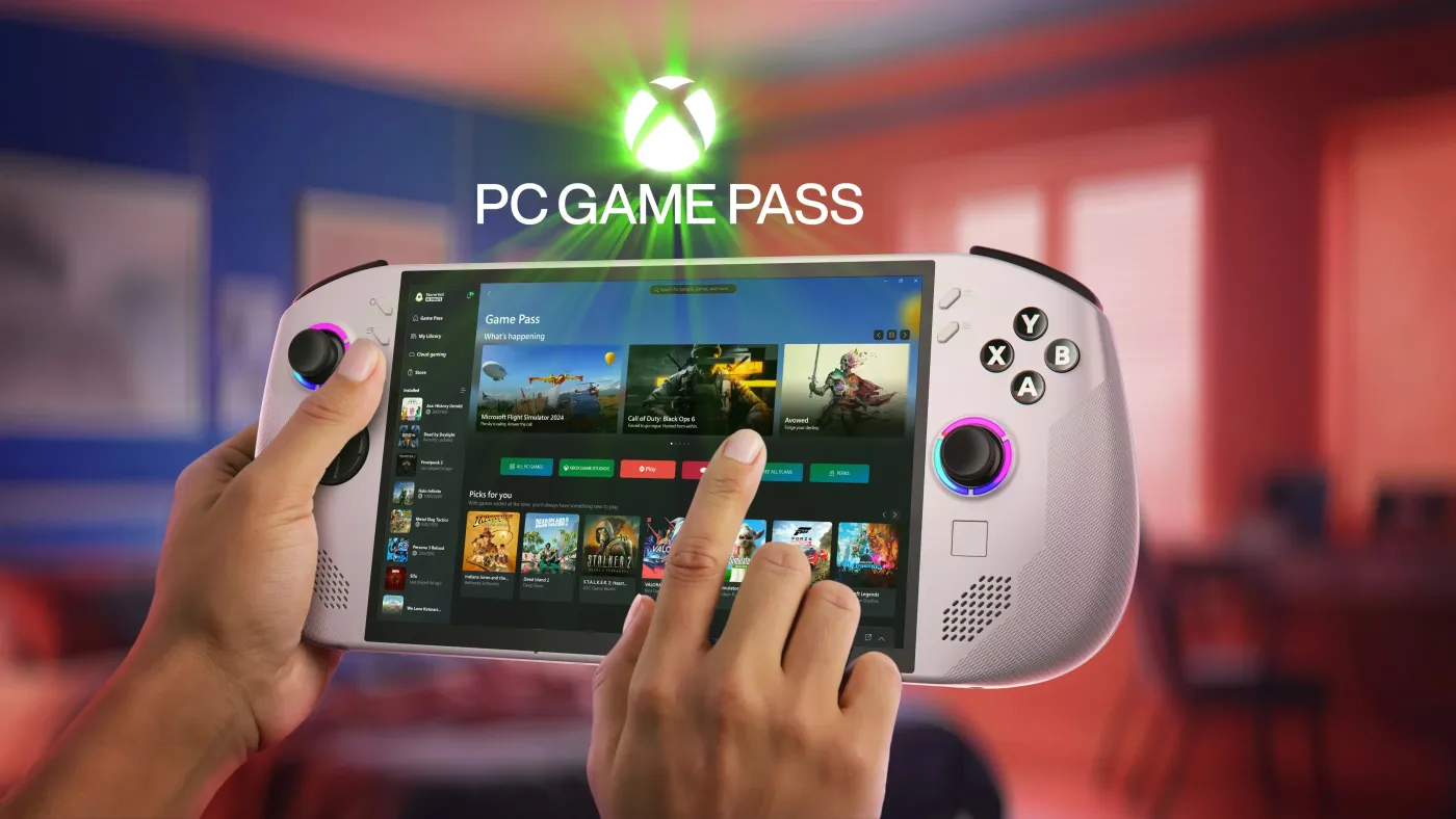 Hands holding Lenovo Legion Go S Gen 1 (8") gaming handheld displaying Xbox Game Pass library in a cozy room.