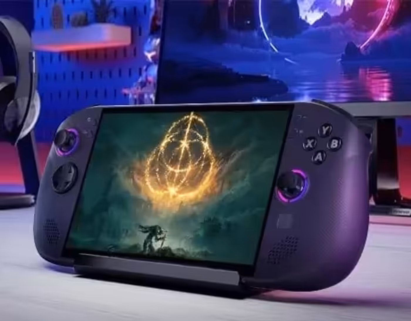 Lenovo Legion Go S Gen 1 (8") gaming handheld on a desk stand displaying an open-world RPG game.