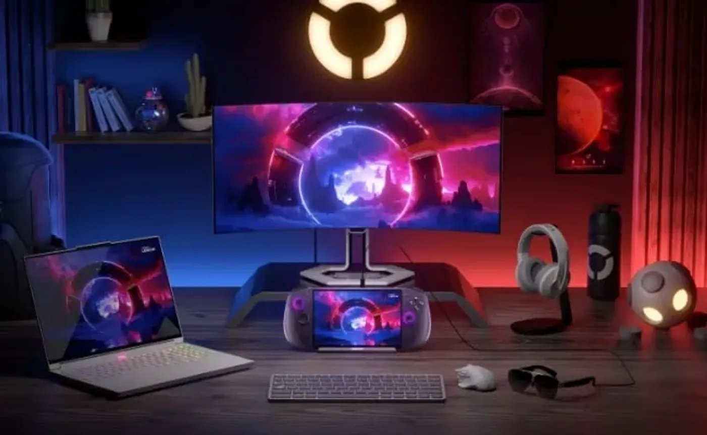 Hands using a Legion Go S on a table in a bar playing a Monster game