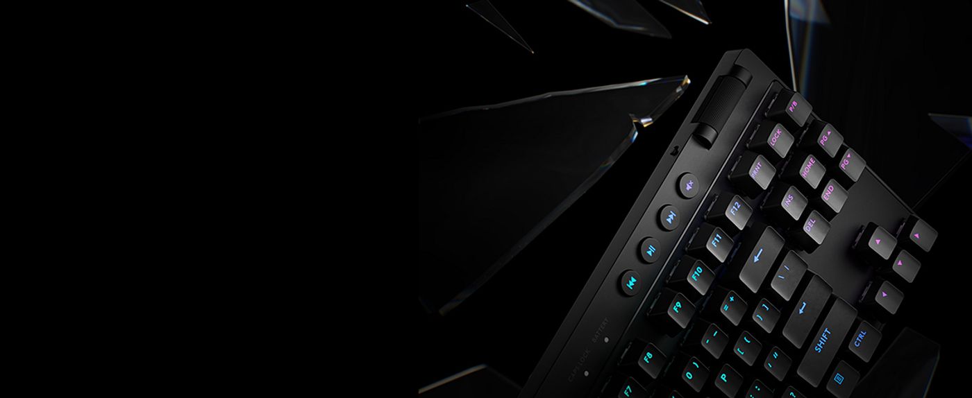 Logitech G PRO X TKL LIGHTSPEED keyboard in use on a gaming desk alongside a wireless gaming mouse