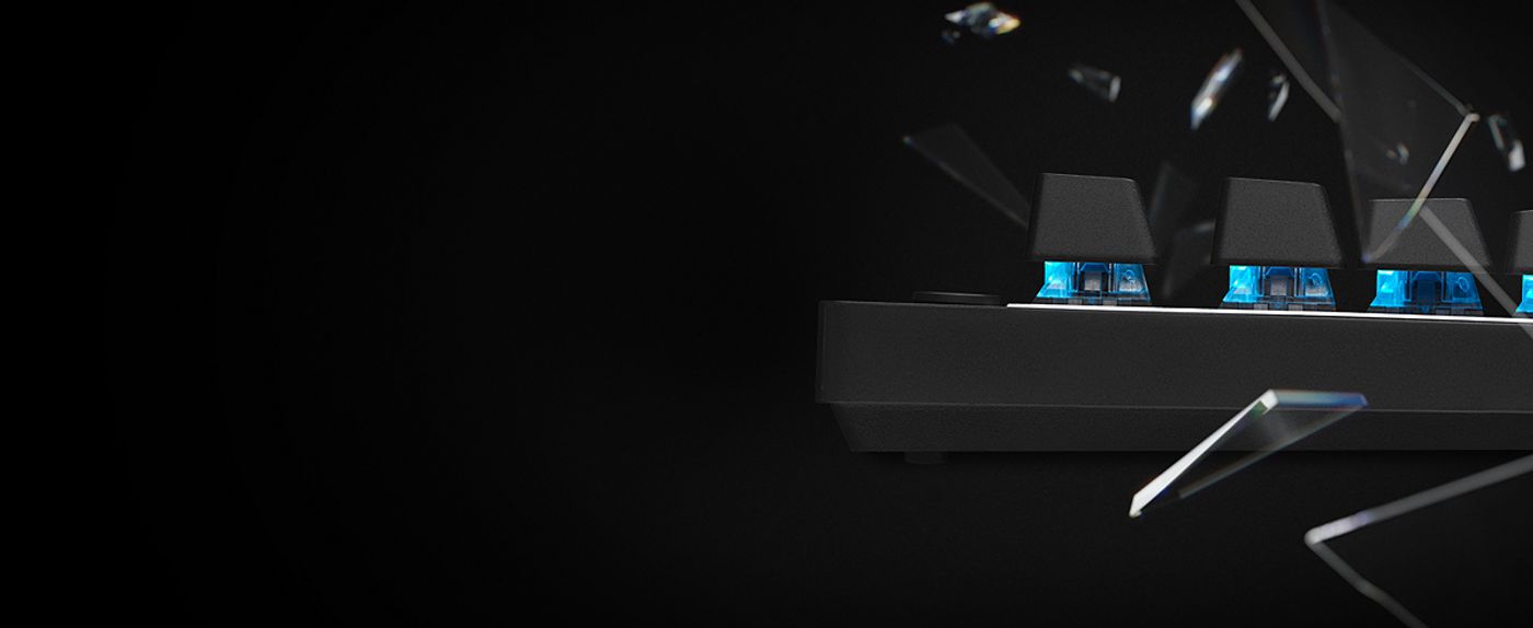 Close-up of the Logitech G PRO X TKL keyboard showing customizable LIGHTSYNC RGB key lighting and the volume roller