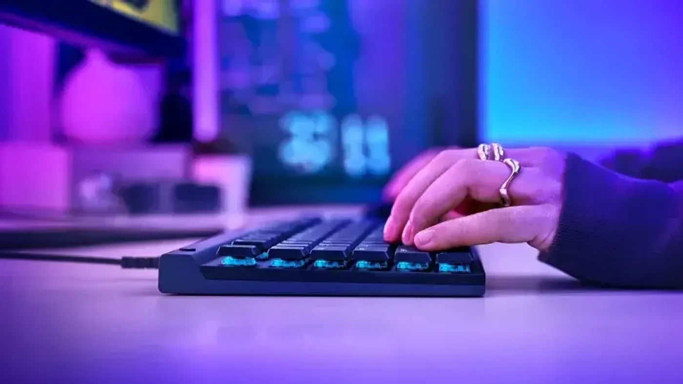 Logitech G515 TKL gaming keyboard in black shown from a low angle highlighting its slim profile