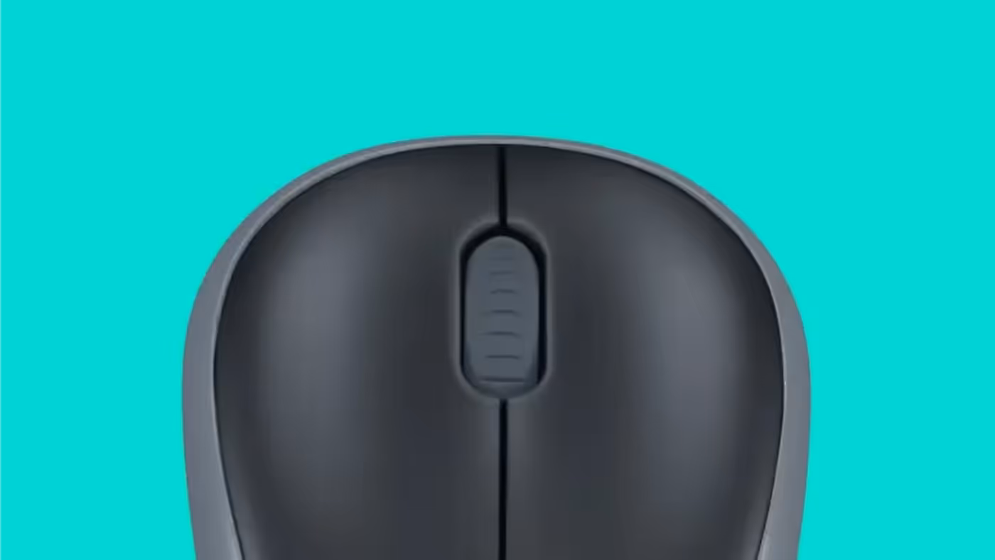 The M185 tracking smoothly across a desk surface during everyday use