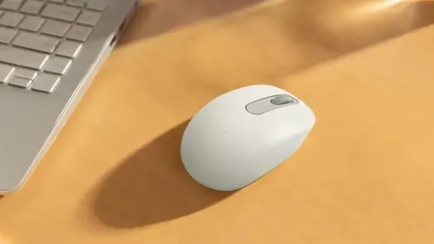 Side profile of the Logitech M196 showing its ergonomic contour