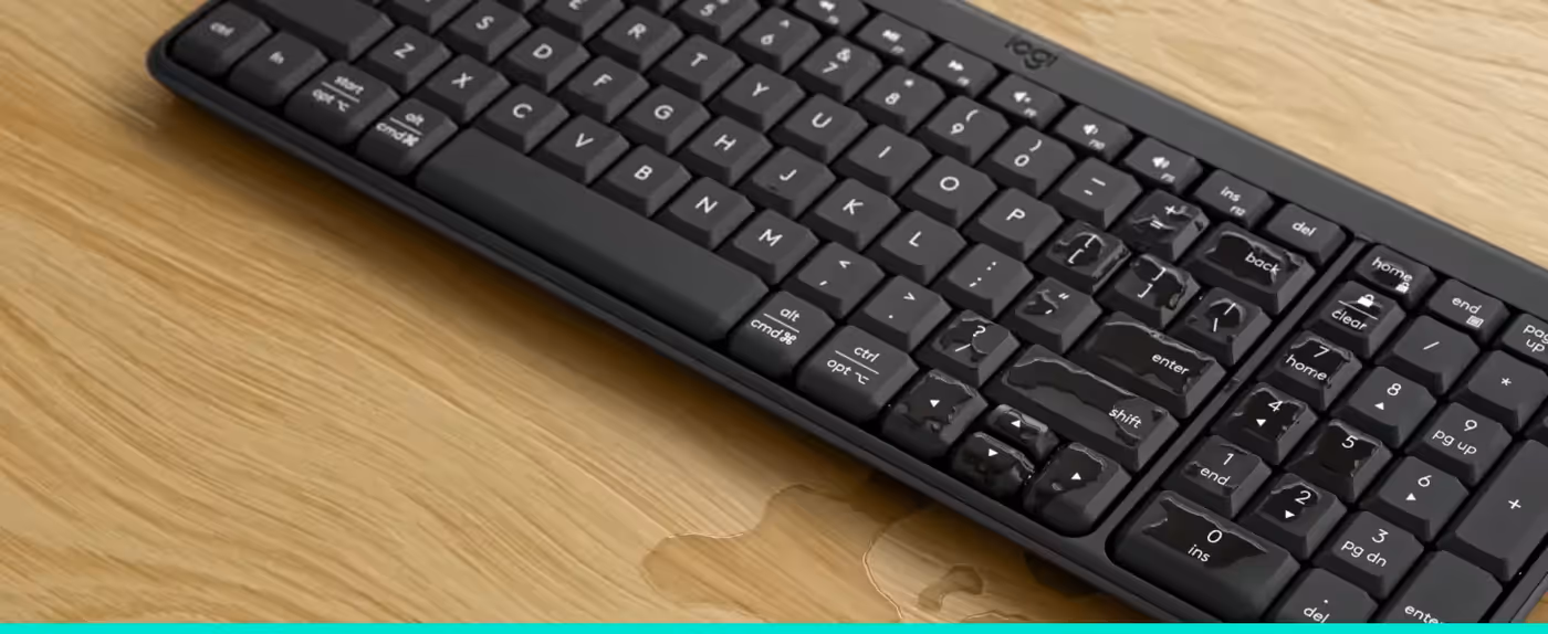 Liquid beading on the spill-resistant surface of the Logitech MK250 keyboard