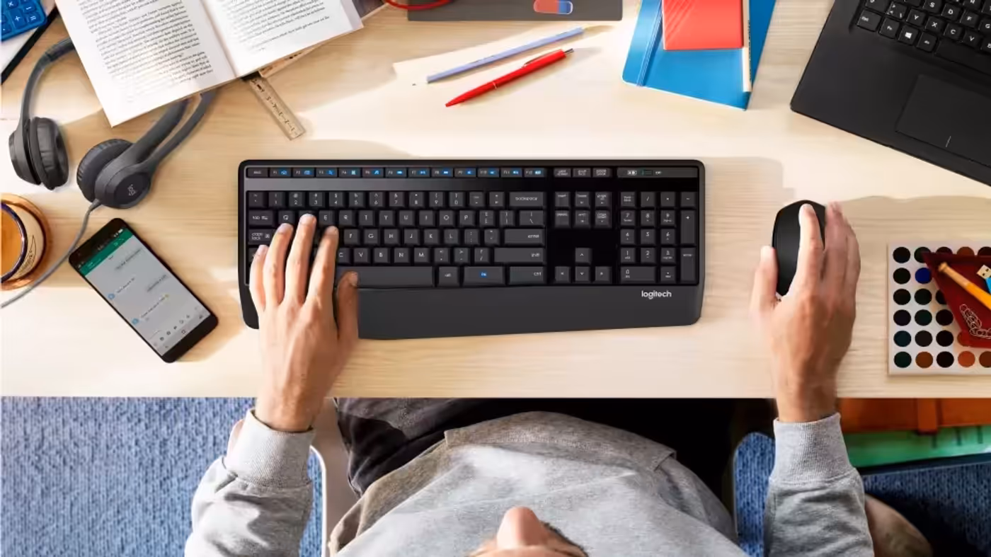 Logitech MK345 full-size keyboard showing its palm rest, media keys and number pad