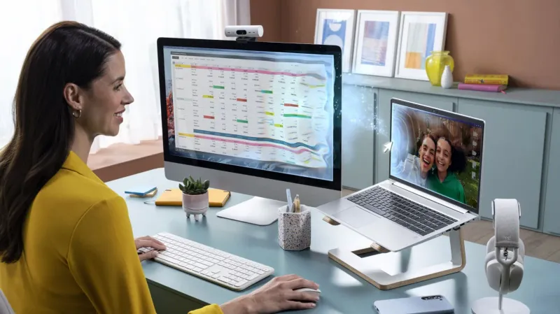 Logitech wireless combo connected across personal and work computers for seamless file transfer