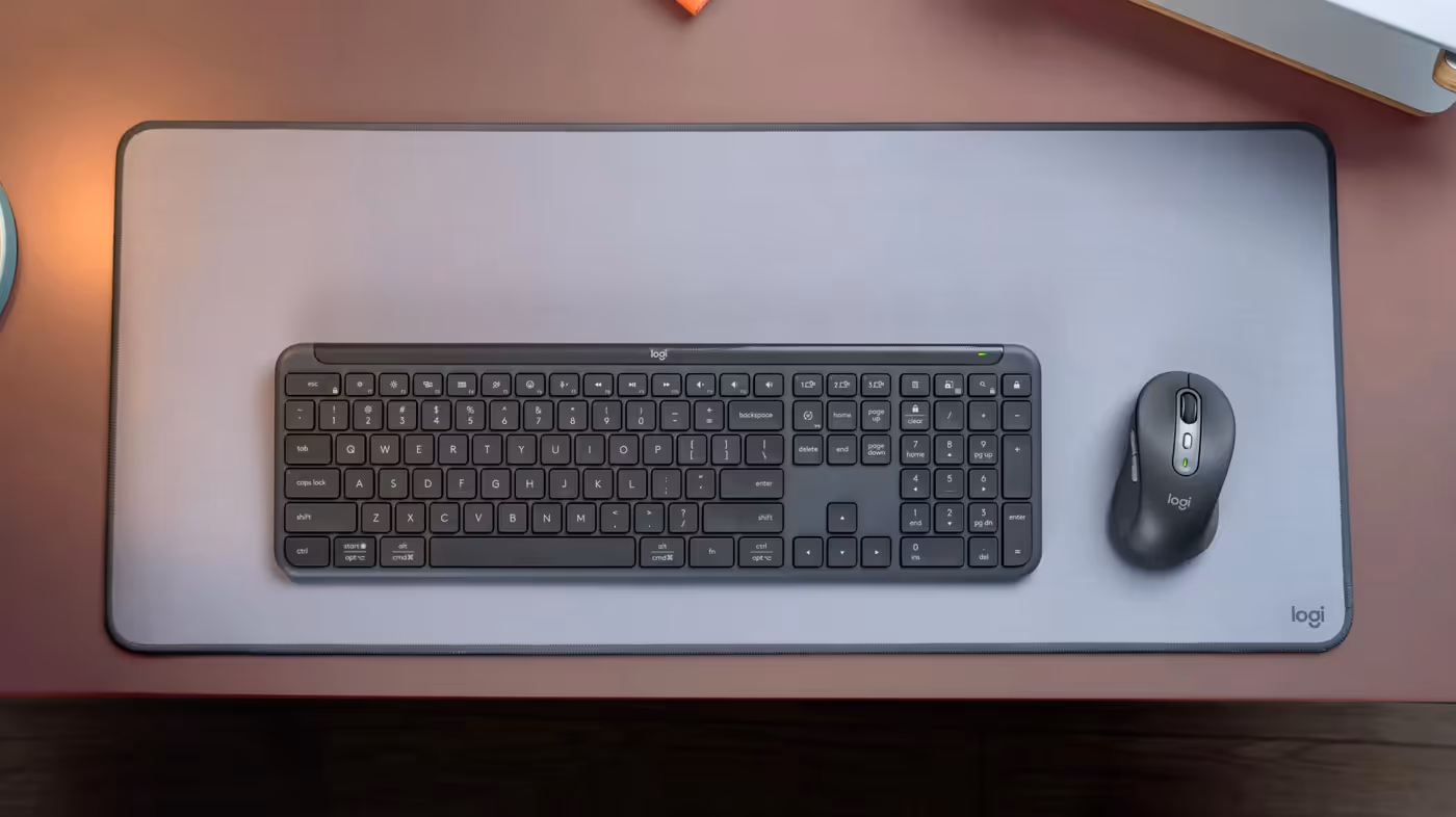 Sleek keyboard and contoured mouse built with recycled plastic