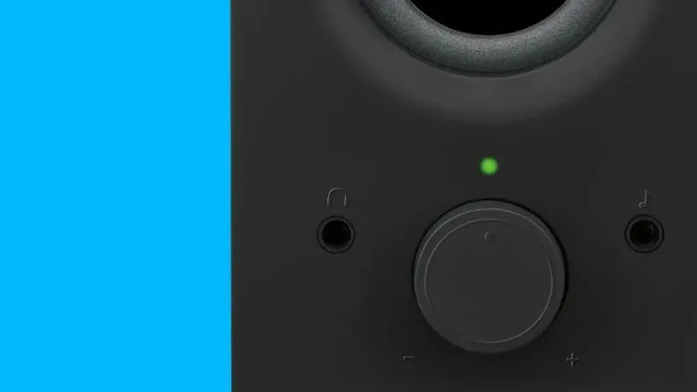 Close-up of the front-facing headphone jack on the Logitech Z150 speaker