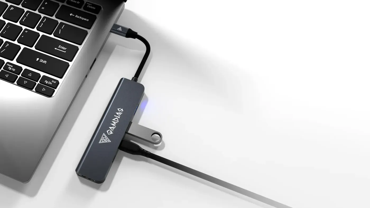 Close-up of expansion hub showing USB-C, USB-A, and HDMI connectivity ports