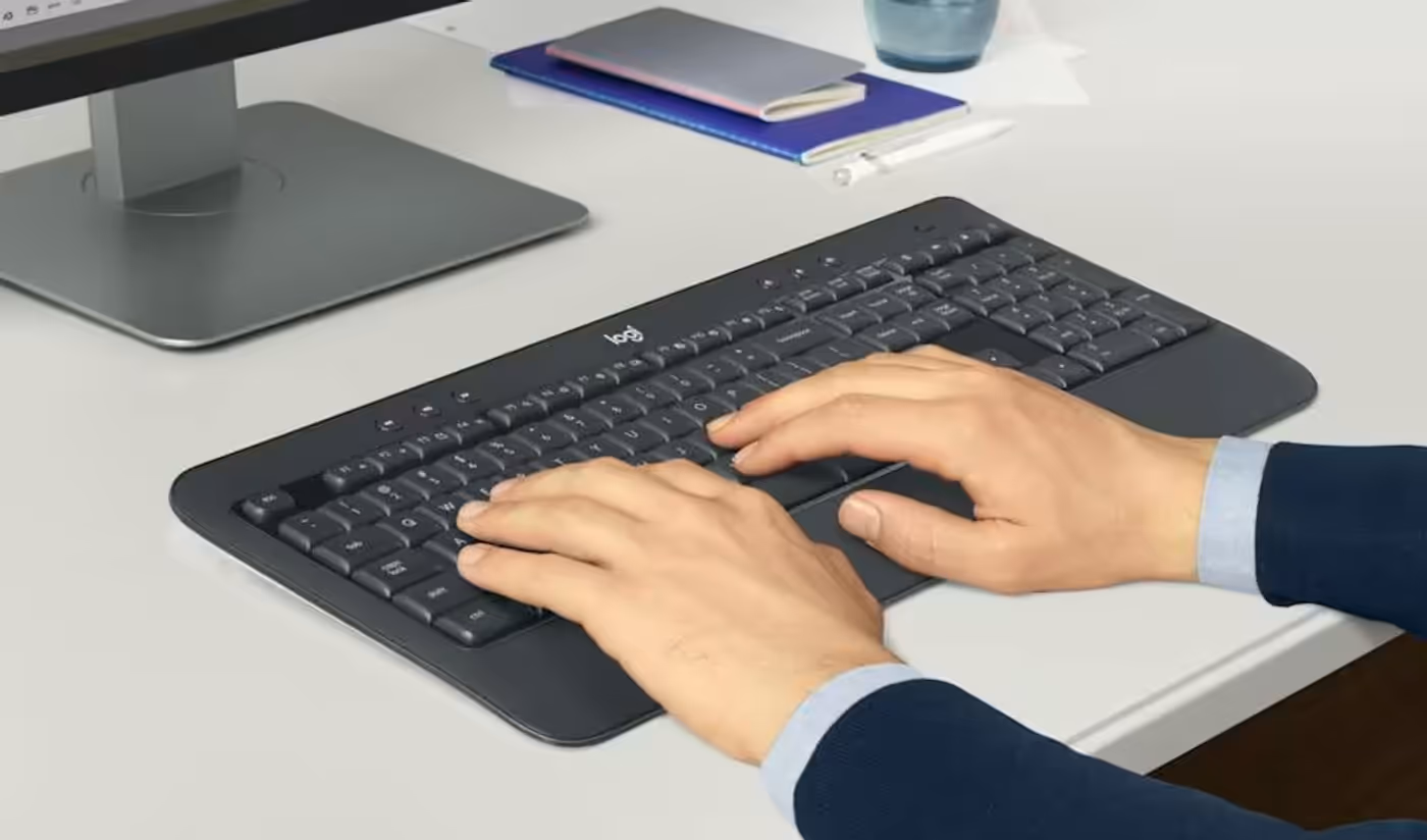 Keyboard showing familiar typing layout with palm rest and adjustable tilt