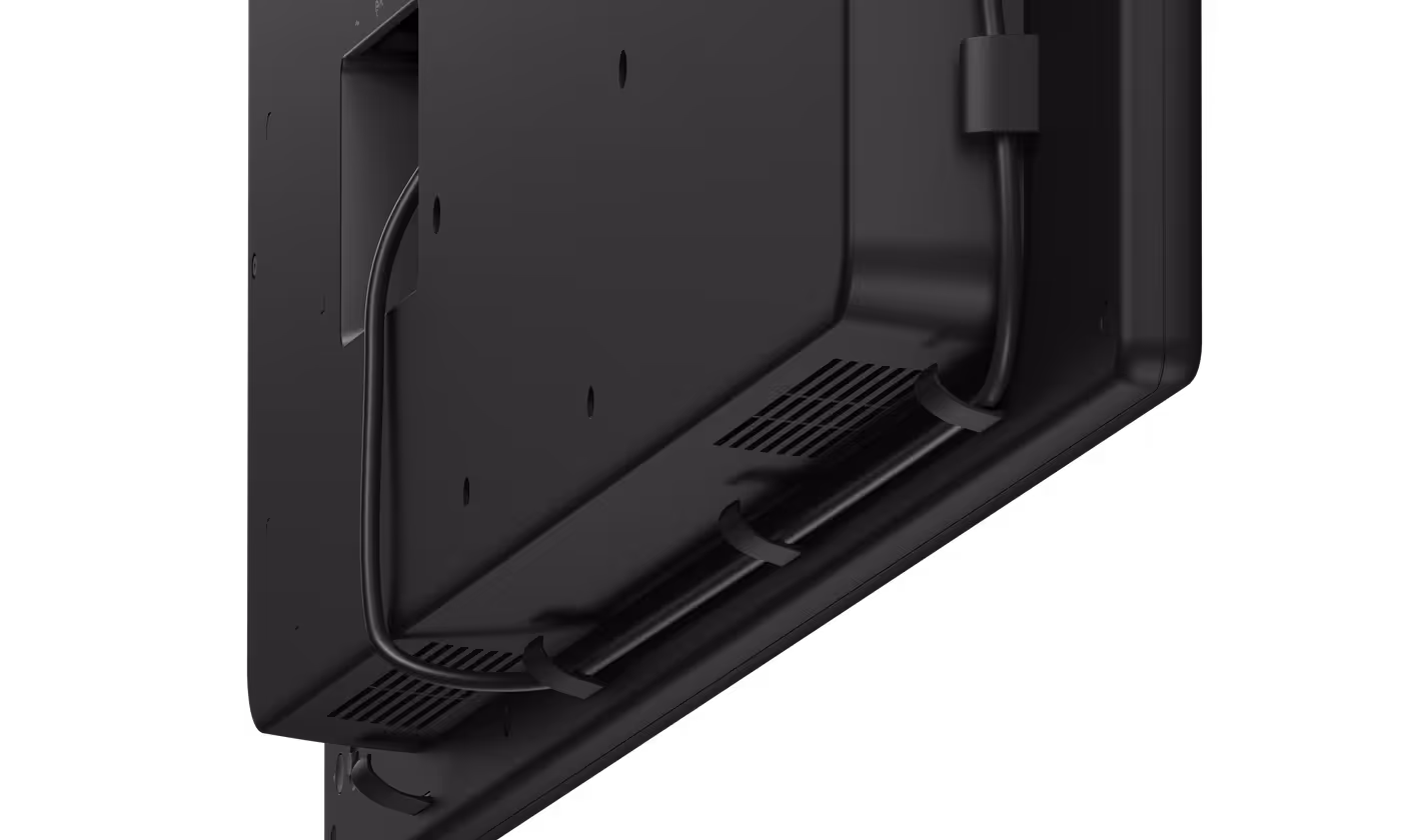Cable management clips on Dell Pro 55 Plus monitor for organized workspace