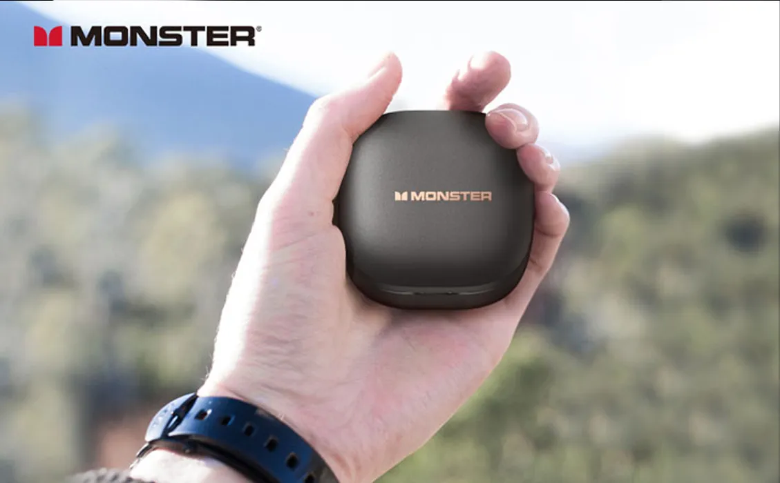 Sleek black Monster Clarity 550 LT wireless earbuds highlighting size and performance