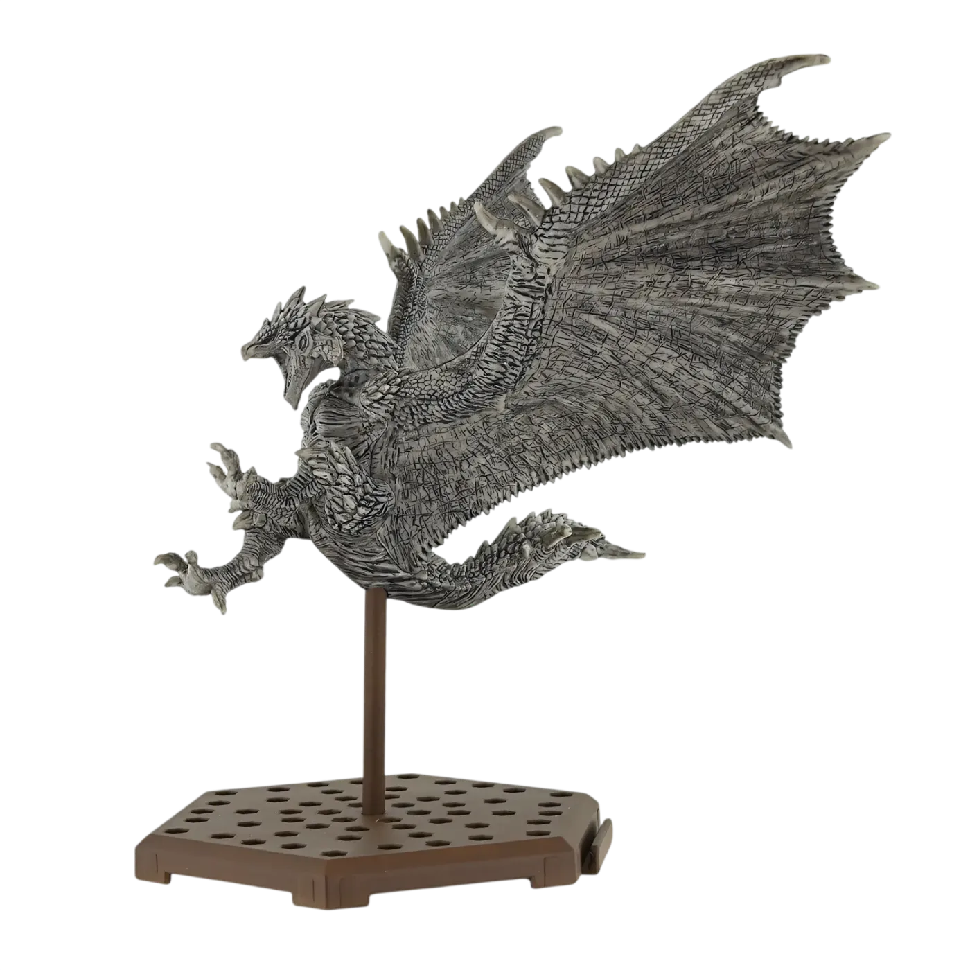 Dynamically posed Monster Hunter stone figure in mid-action stance