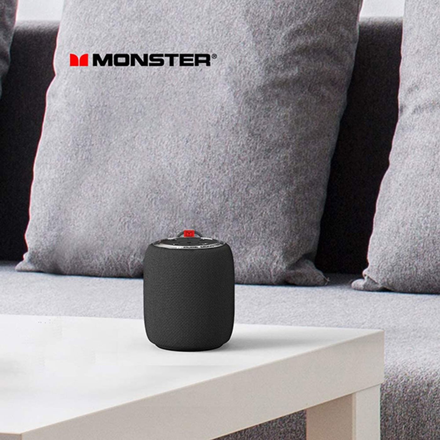 Compact Monster S110 speaker with its detachable carry strap attached