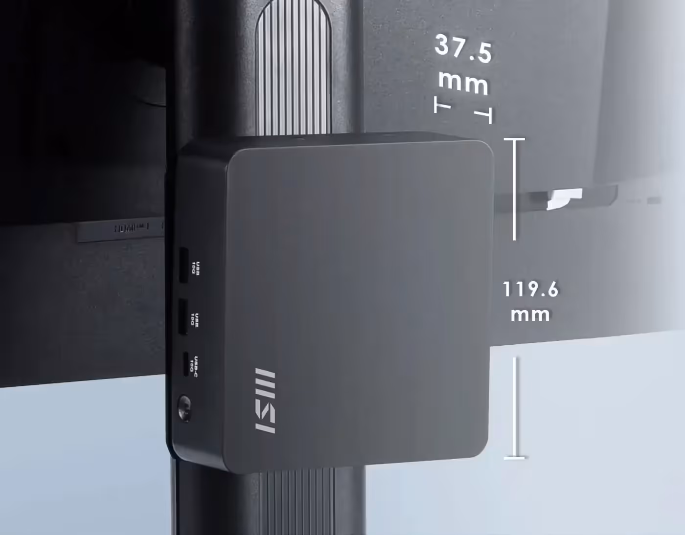 Cubi NUC mini PC mounted on a wall in an modern office setup