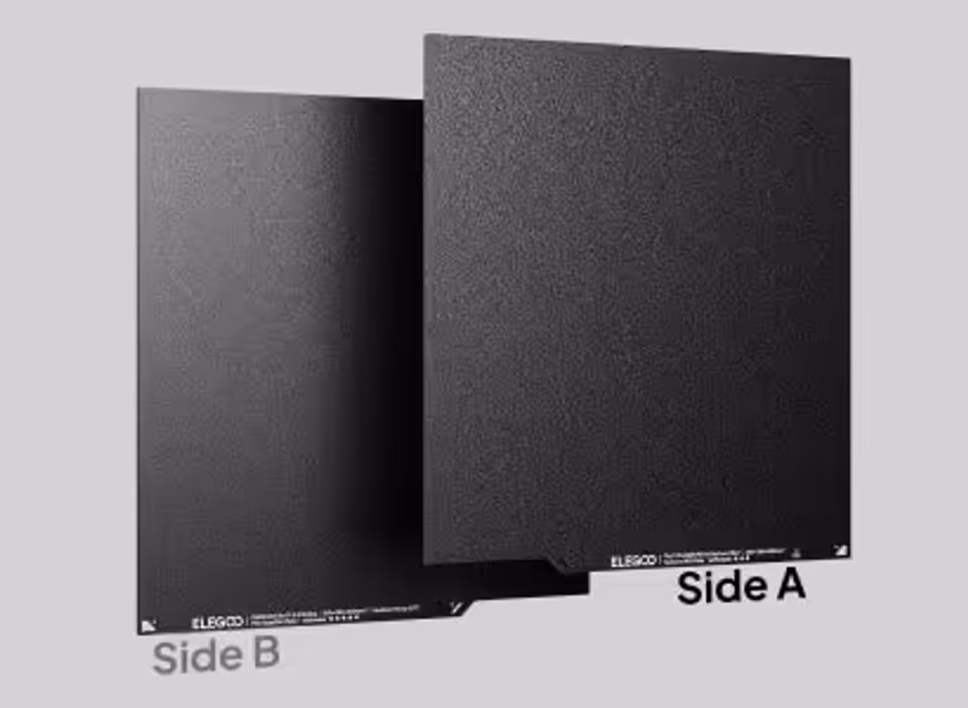 Dual-sided build plate showing textured PEI and specialized PLA surfaces