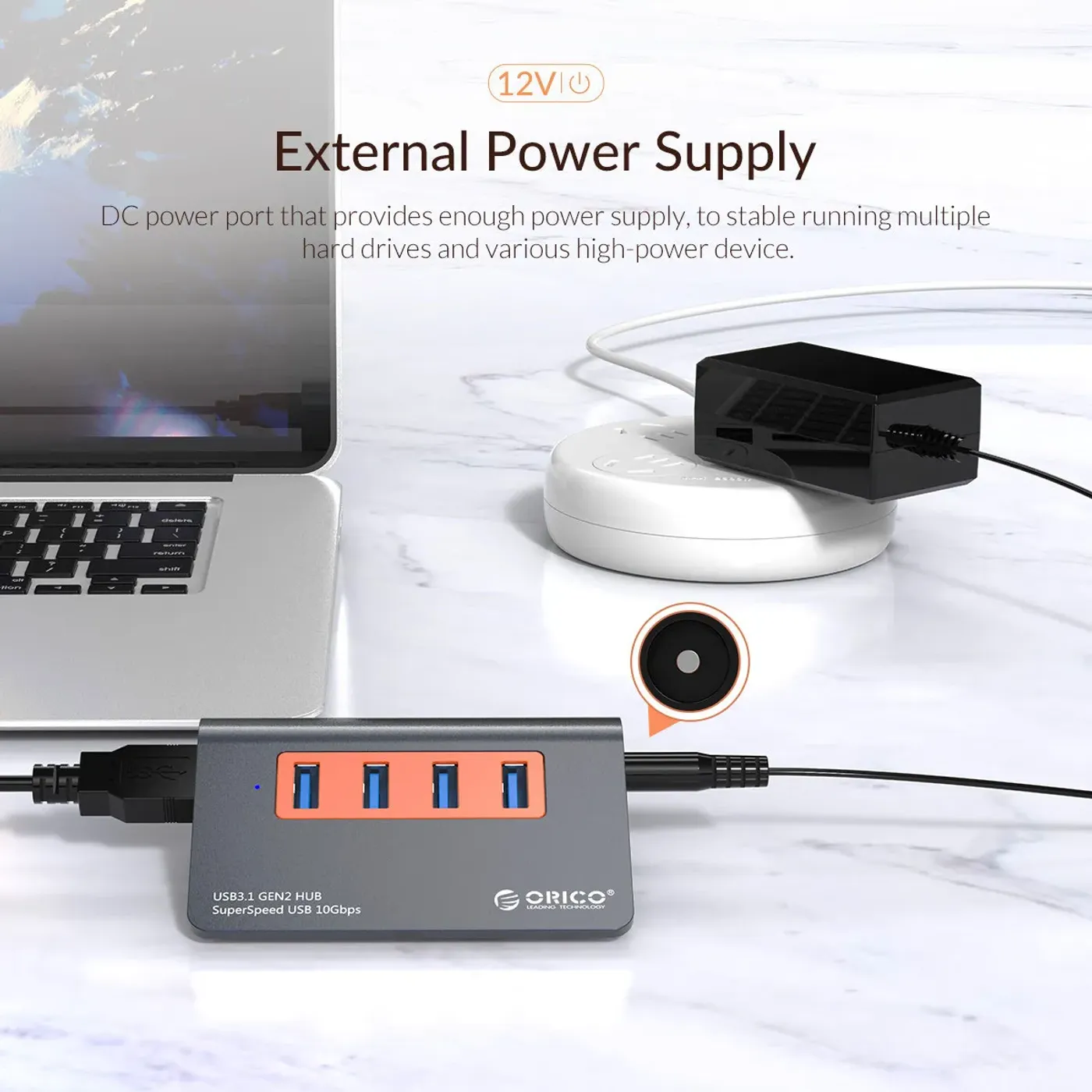 Top view of the Orico 4-port USB hub showing its aluminium finish