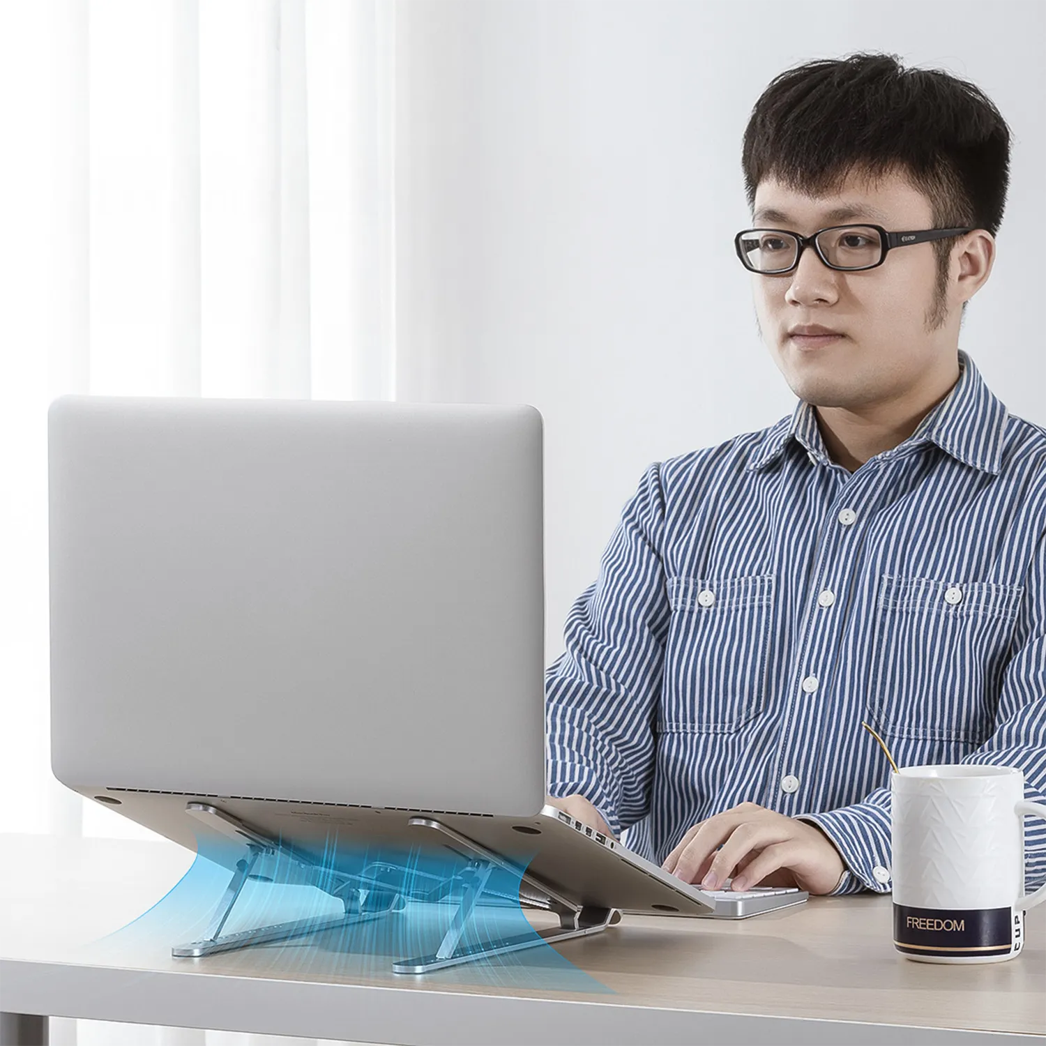 Open ventilation on ORICO silver laptop stand for better cooling