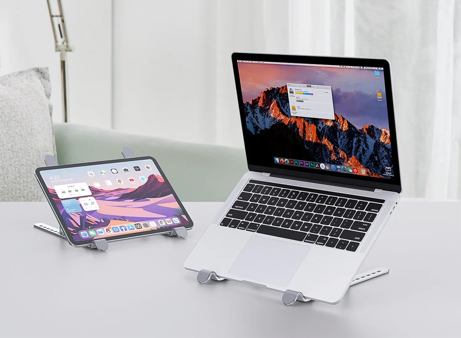 Foldable ORICO laptop stand used for phones, tablets, and books