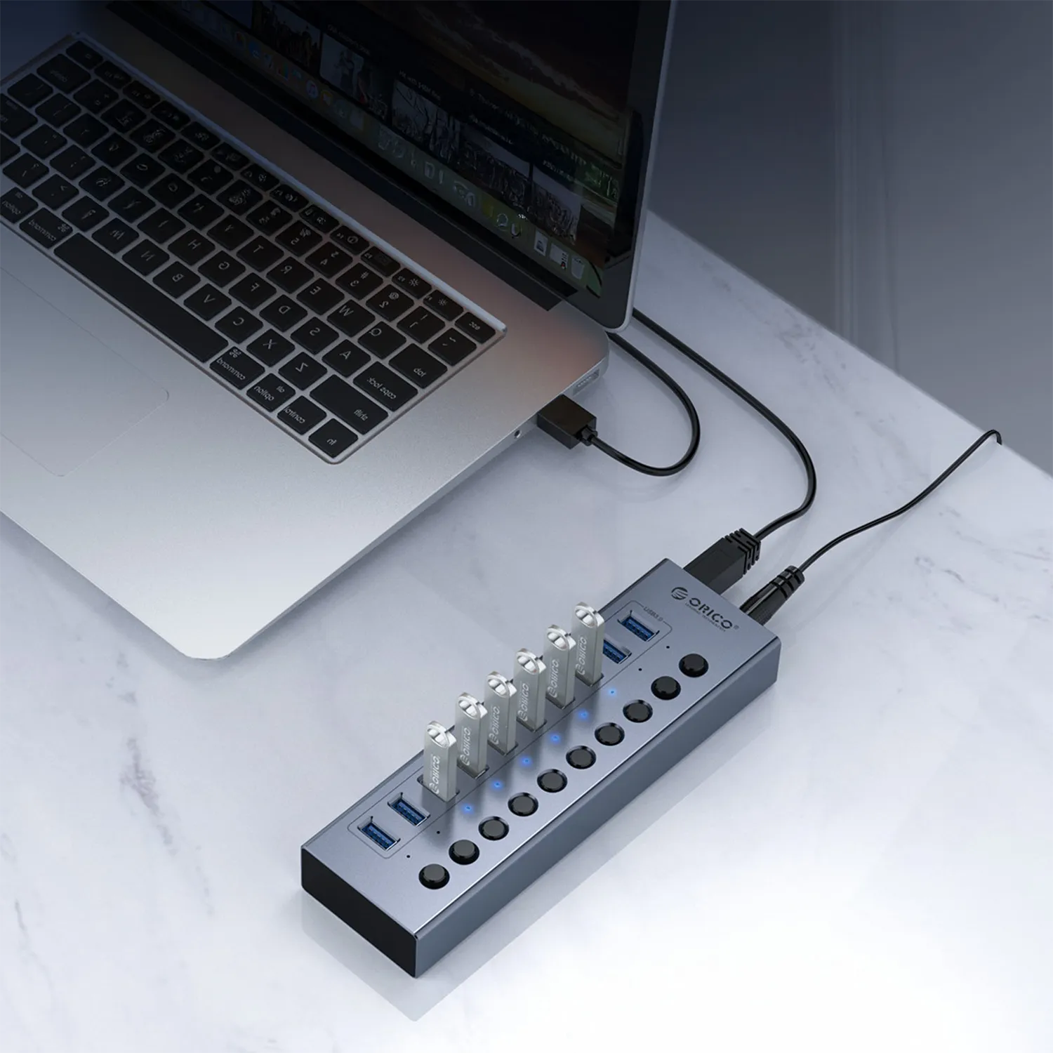 USB hub with independent switches for device control