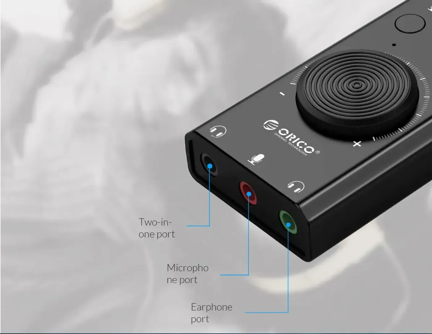 Orico SC2 USB audio adapter showing triple port output configuration