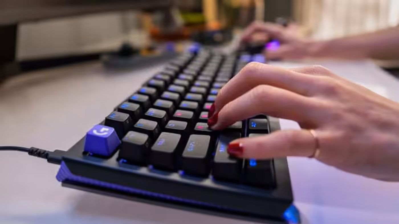 User adjusting precision analog actuation settings on the keyboard