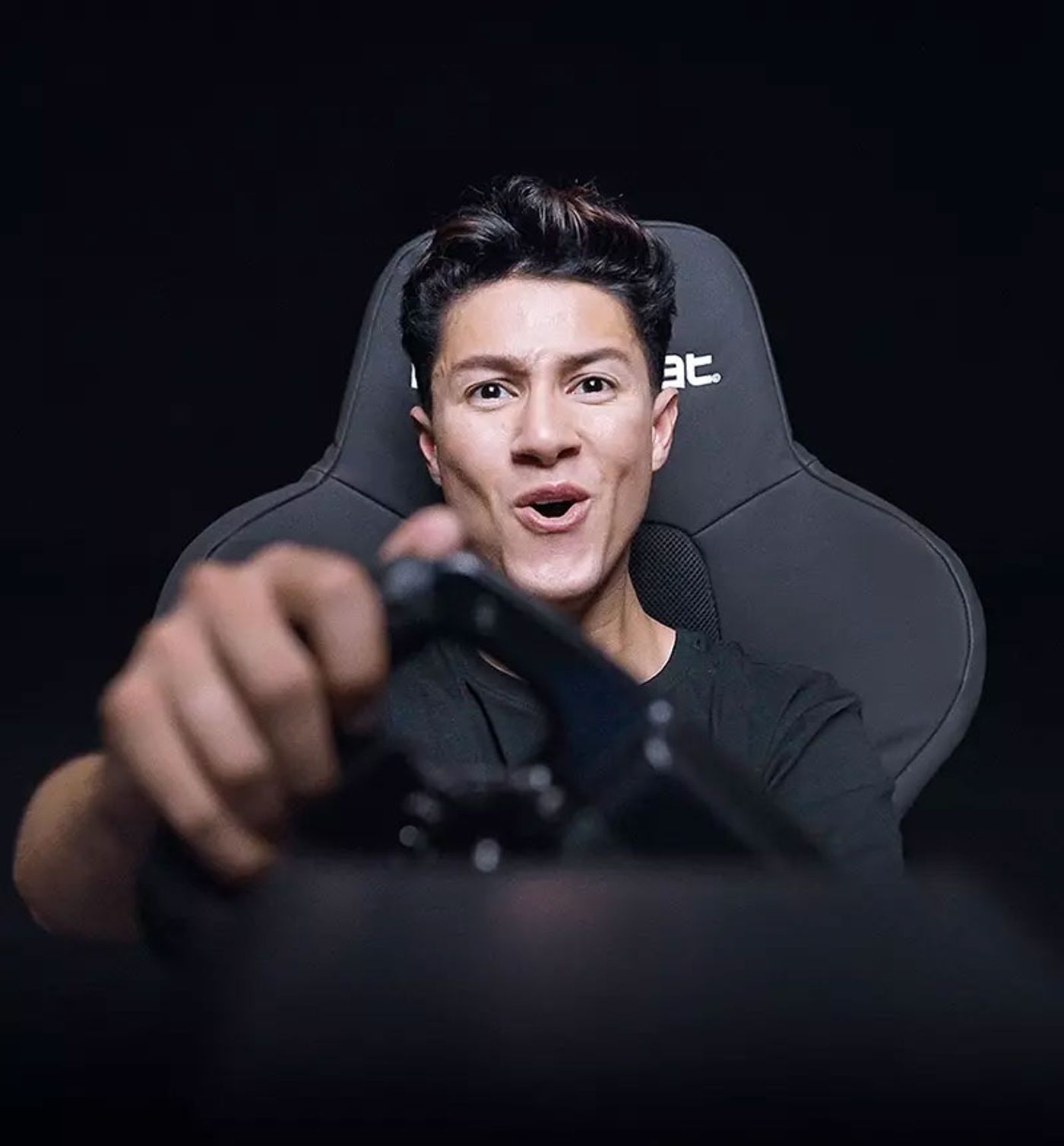 Side profile of the Playseat Trophy showing its frameless seat structure