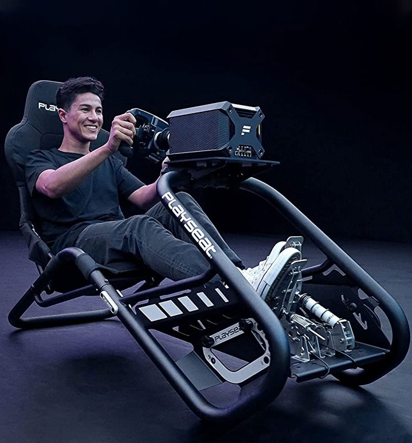 Adjustment points on the Playseat Trophy including the pedal plate and backrest