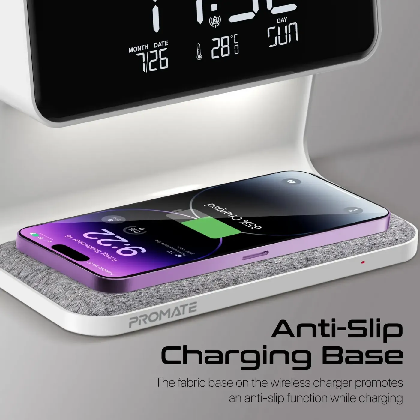 Promate LUMIX-15W LED alarm clock with wireless charging pad on a bedside table