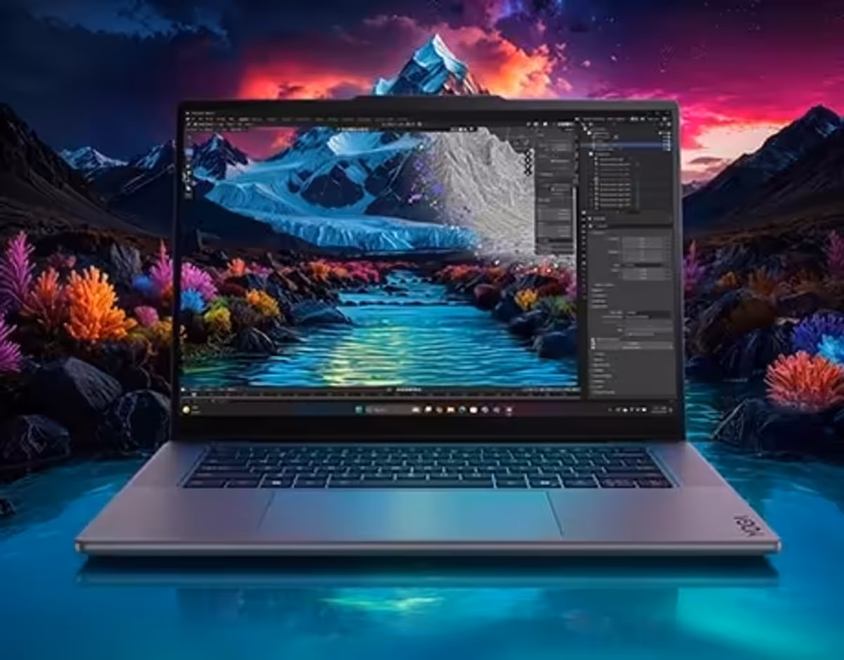 Front view of the Lenovo Yoga Pro 7i Gen 11 Aura Edition (15” Intel) with a mountain view on the display that extends into the background.