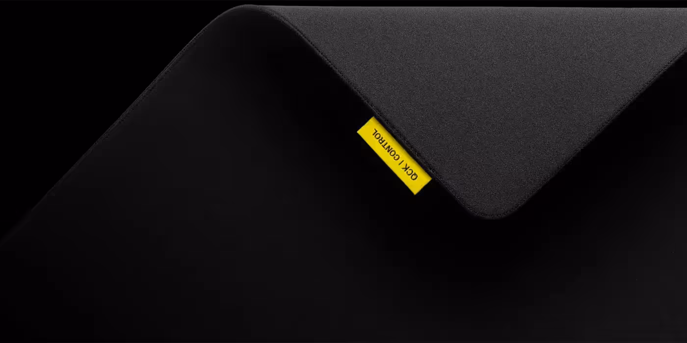 SteelSeries QcK Performance L Control mouse pad shown flat on a desk