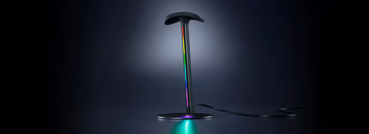 Razer Base Station V3 Chroma displaying 12-zone RGB lighting effects on a desktop setup