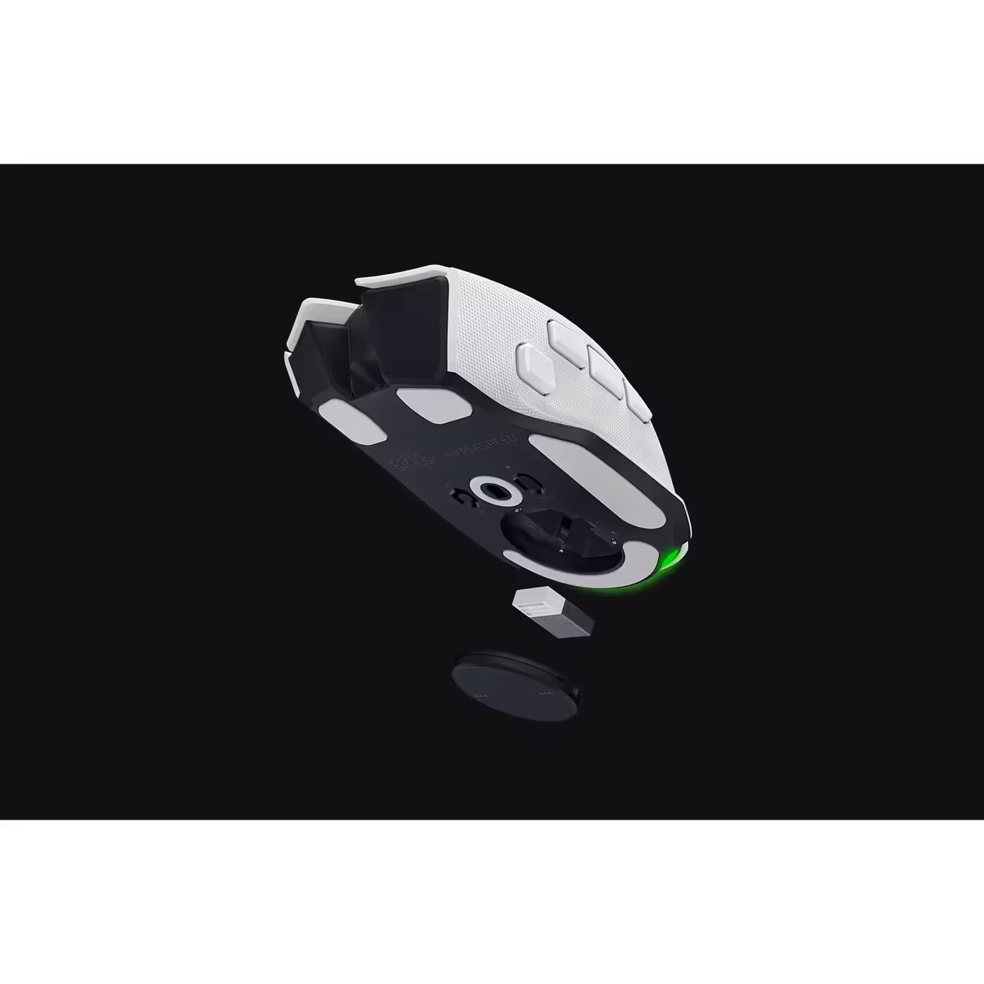Underside of the white Razer Basilisk V4 HyperSpeed showing its PTFE feet and dongle