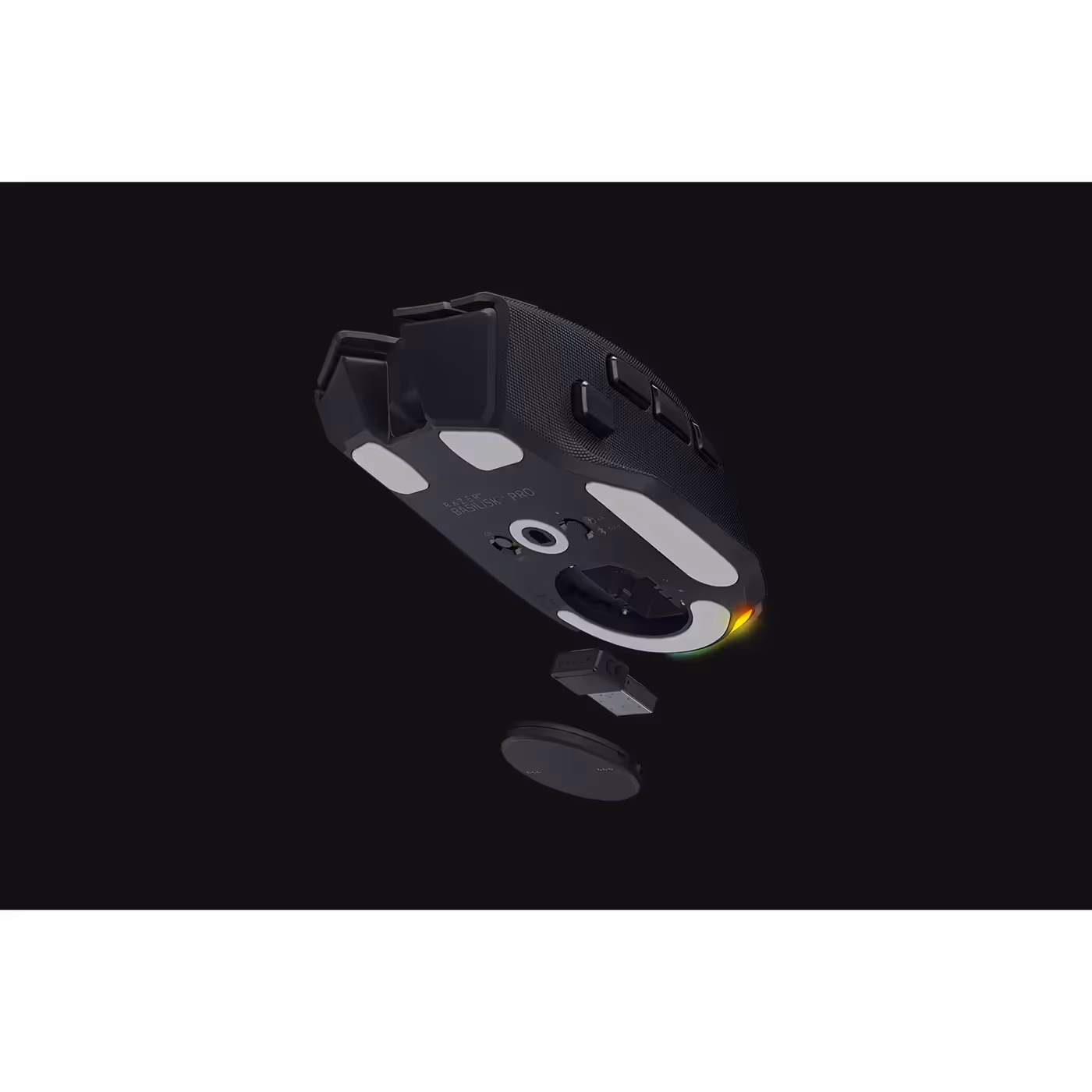 Underside of the Razer Basilisk V4 Pro showing its PTFE feet and Mini Dongle
