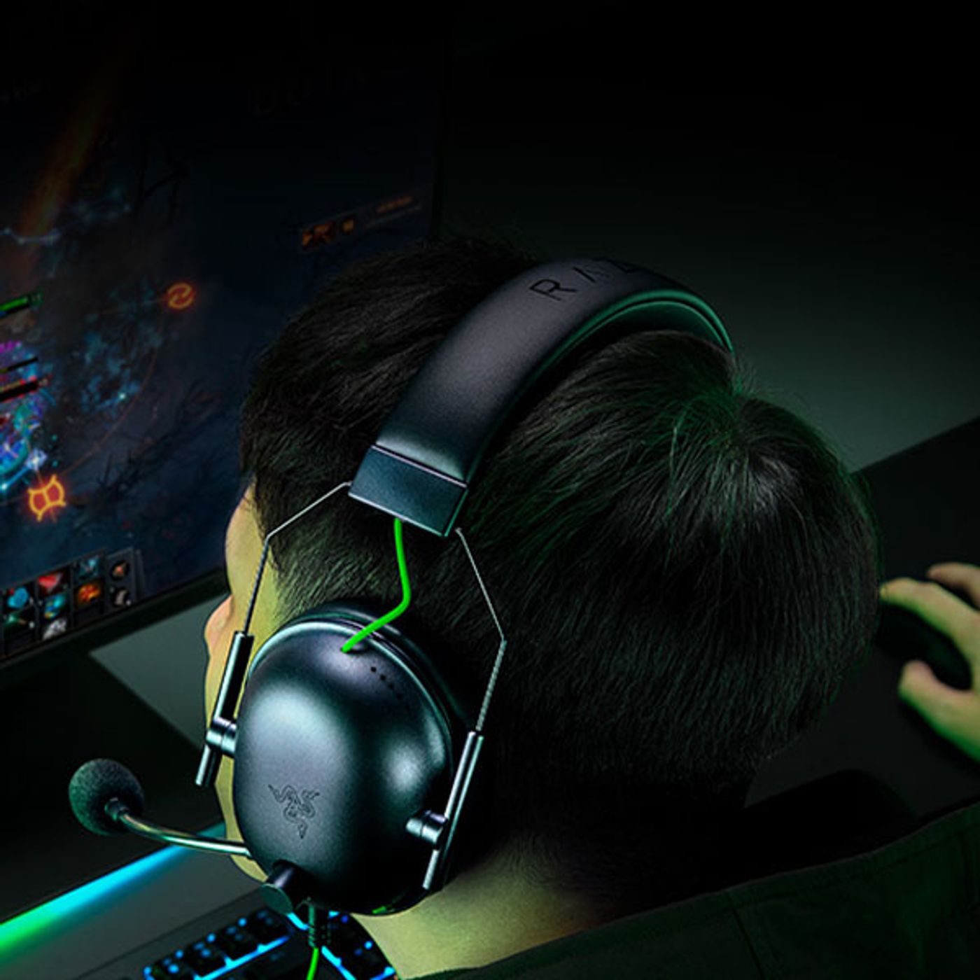 Razer BlackShark V2 X headset showing noise-isolating earcups