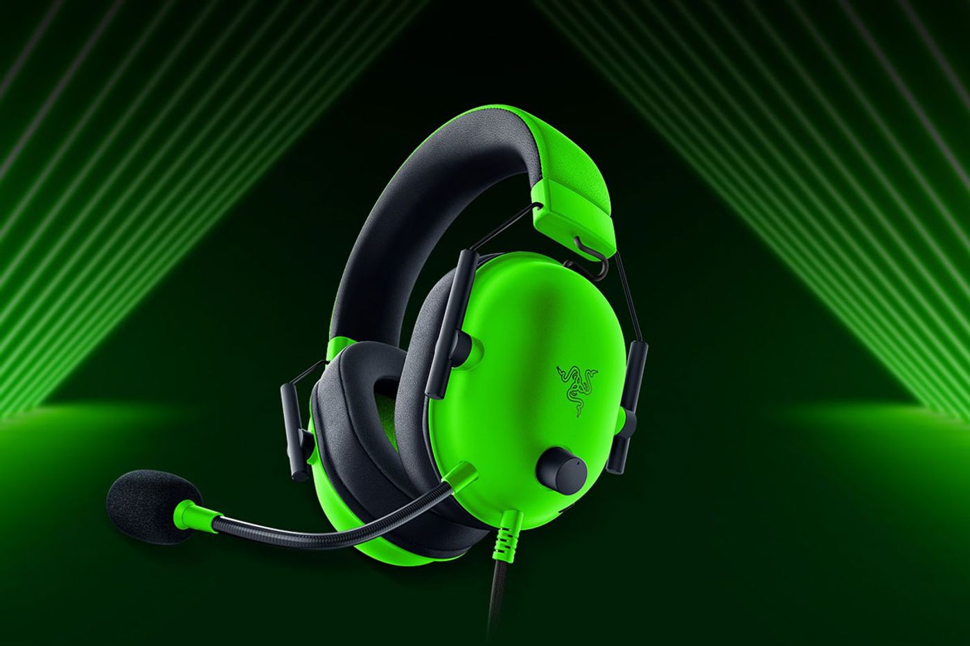 Razer BlackShark V2 X gaming headset shown from the side in the Razer Green colourway