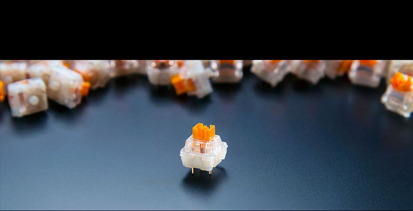 Pre-lubricated Razer Orange Tactile Switches fitted to the BlackWidow V4 75%
