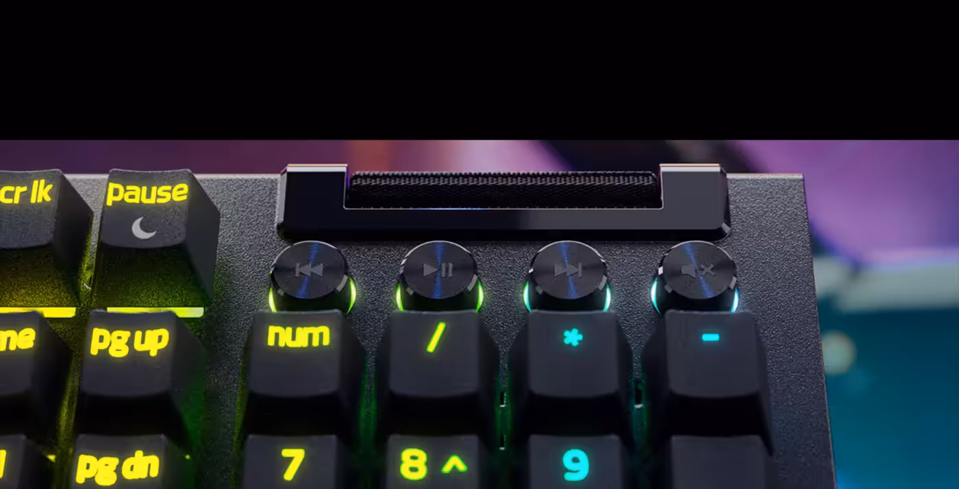 Multi-function roller and four media keys providing convenient playback and volume control