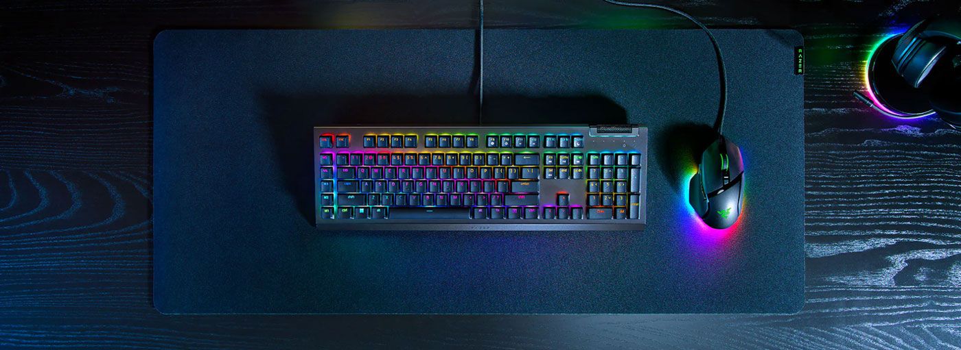 Razer BlackWidow V4 X wired gaming keyboard shown in full with its lighting on