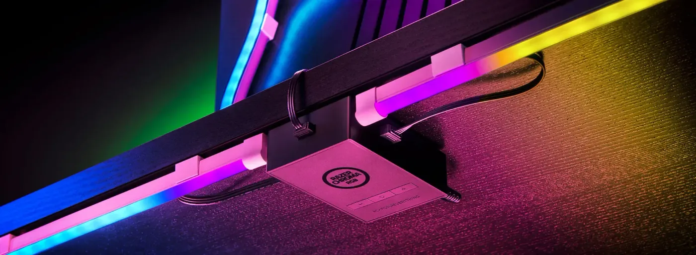 Razer Chroma Light Strip Set glowing behind a desk setup