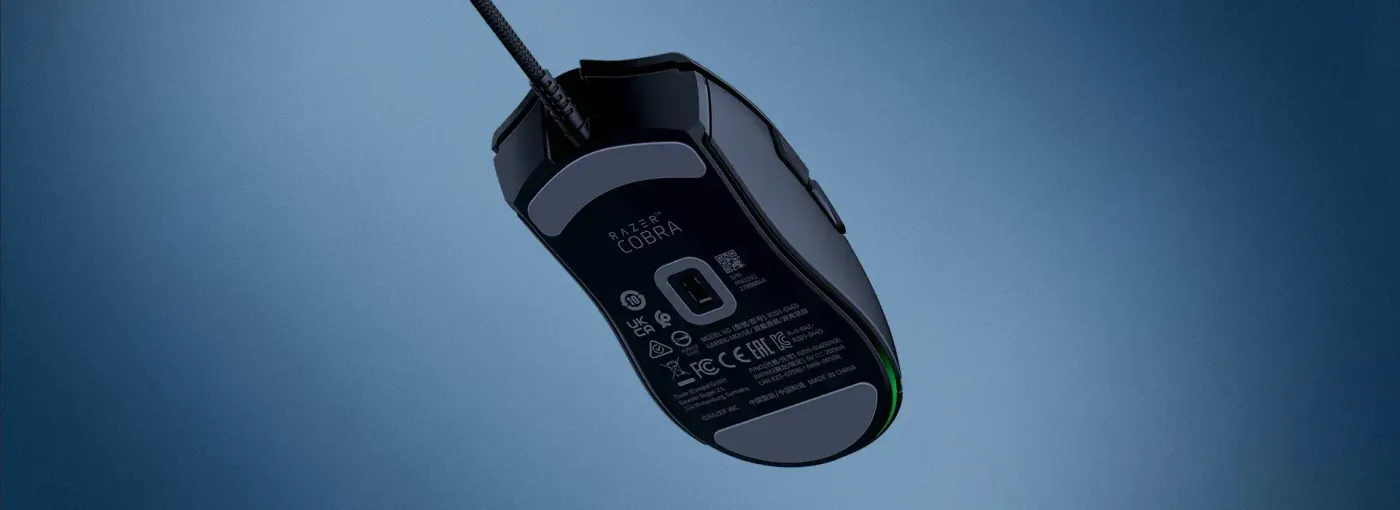 Detailed view of the Razer Cobra showing its PTFE mouse feet and Speedflex cable