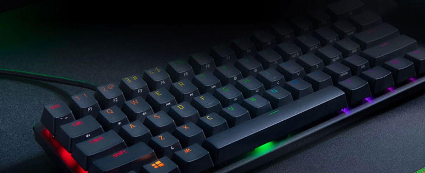 Side-printed secondary functions on the doubleshot PBT keycaps of the Huntsman Mini
